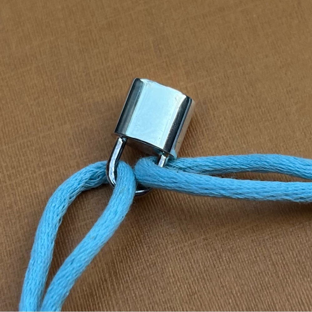 Louis Vuitton Silver Lockit X Doudou Bracelet, Adjustable Baby Blue Cord - Picture 5 of 11